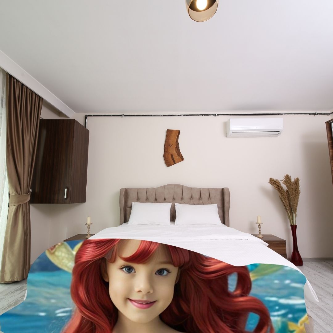 Example of how to upload a girl's photo to create a personalized mermaid portrait on a blanket featuring her as a mermaid sitting on a rock in an underwater scene.