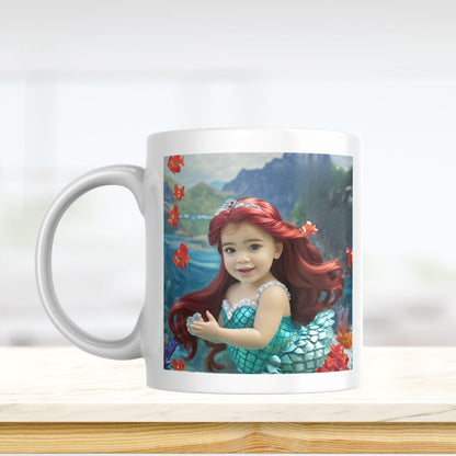 Example of how to upload a toddler girl's photo to create a personalized mermaid portrait on a mug featuring her as a mermaid sitting on a rock in an underwater scene.