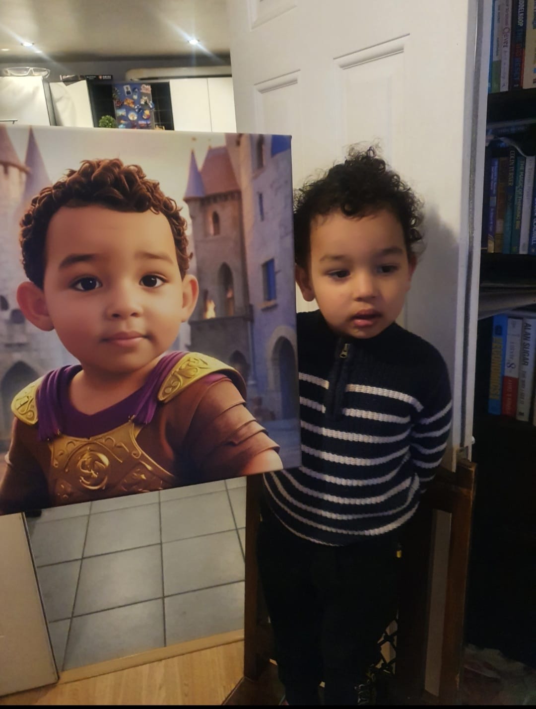 A young boy smiling holding his personalized portrait canvas, featuring himself dressed on a ship deck. The vibrant canvas showcases her custom design, with his image transformed into a cartoon character.