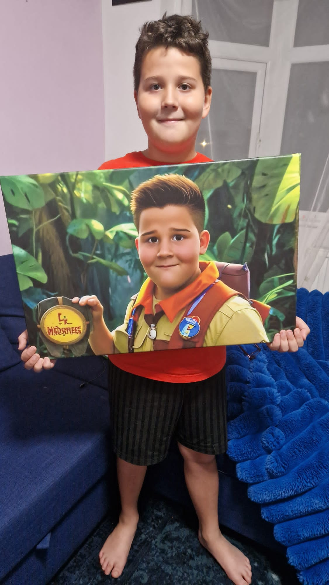 A young boy smiling holding his personalized portrait canvas, featuring himself dressed on a ship deck. The vibrant canvas showcases her custom design, with his image transformed into a cartoon character.