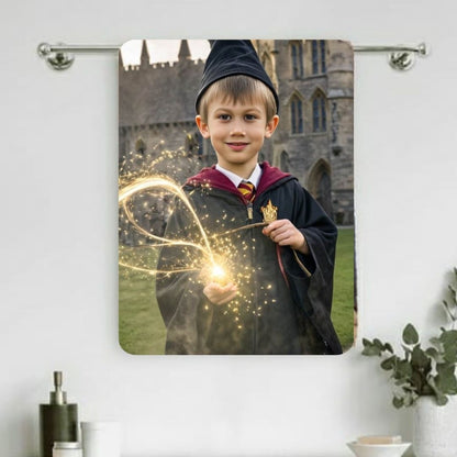 Example of how to upload a boy's photo to create a personalized wizard portrait on a towel, featuring him dressed in a wizard robe and holding his magic wand, ready to cast spells